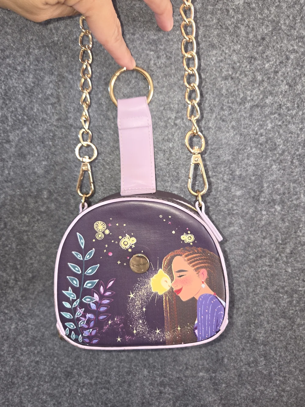 Enchanting crossbody bag features Asha from Disney's 'Wish' animated film,